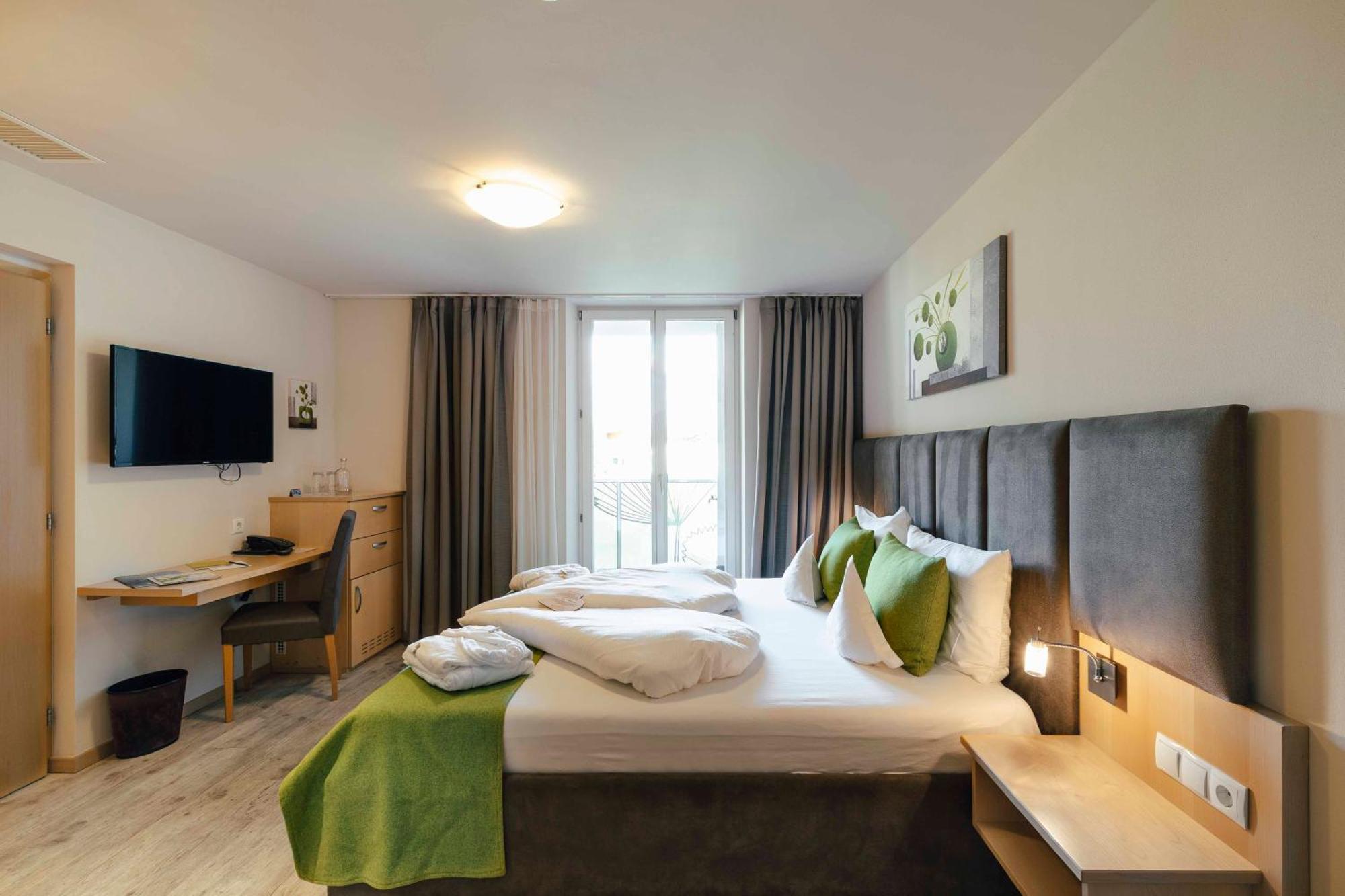 Hotel Pfeiss Lana Rum bild